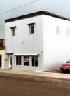 Old brick building sided in new galvanized in Sidney, Mt.